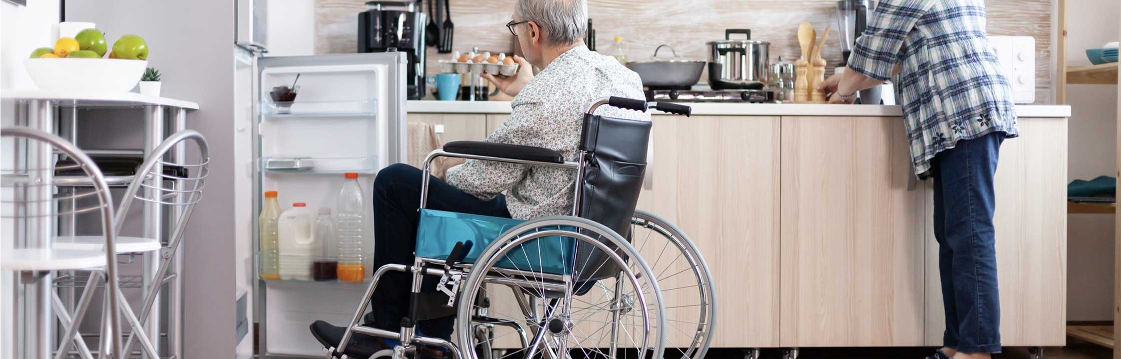 Man in wheelchair in his kitchen